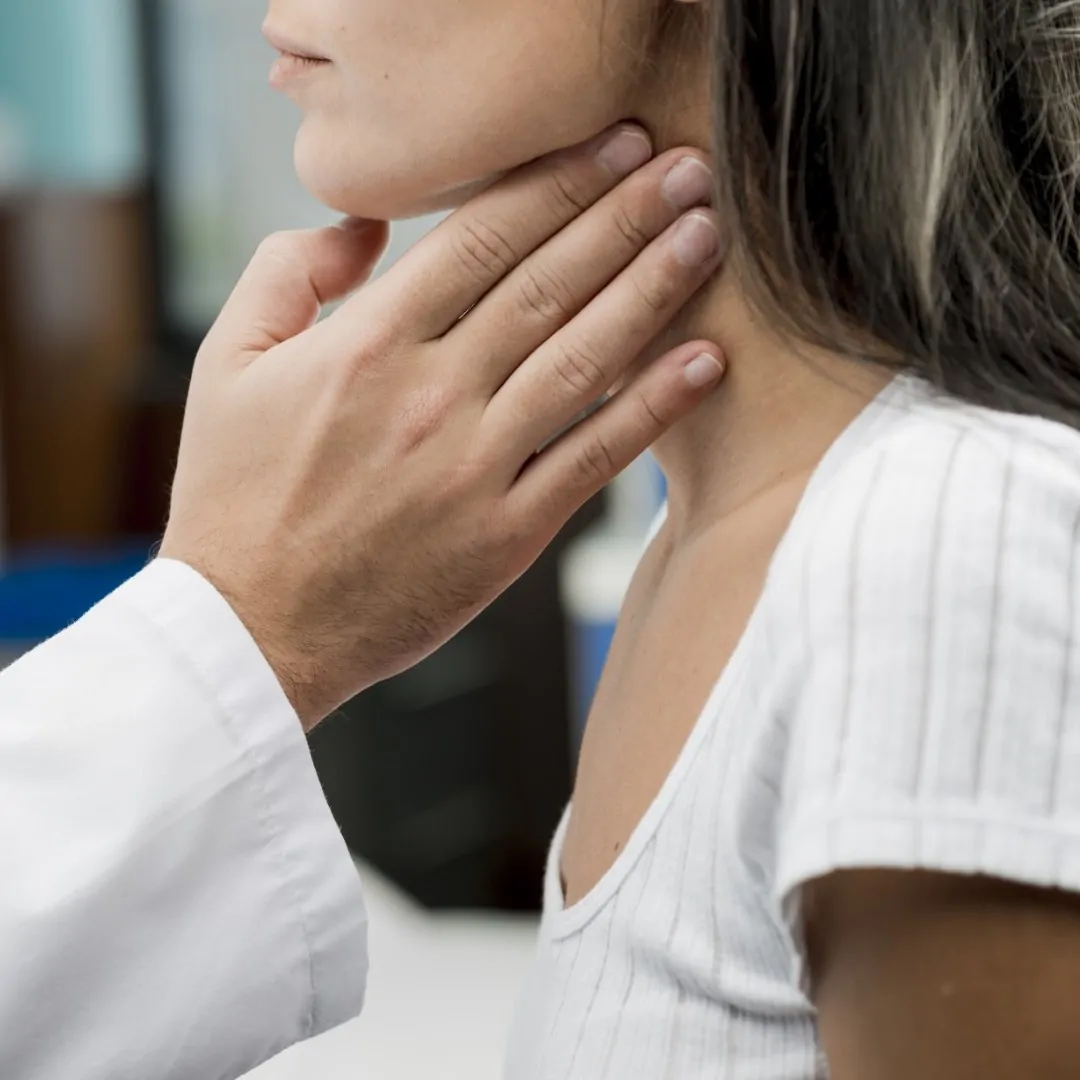 hand-touching-throat-patient